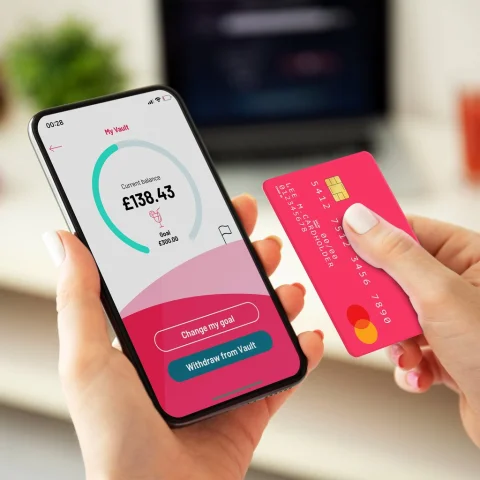 bYond app open on a phone next to a bYond card