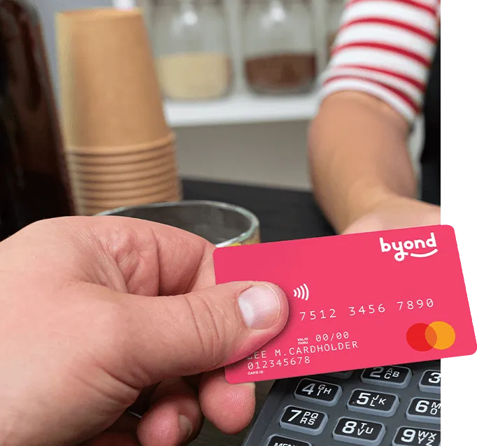 bYond card being used to pay in a coffee shop